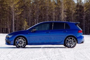Want Amazing Volkswagen Performance? Check Out the New VW Golf R with C's Autohaus in Centerville Oh, image of new blue 2022 volkswagen golf R outside on snowy ground with tree line in background
