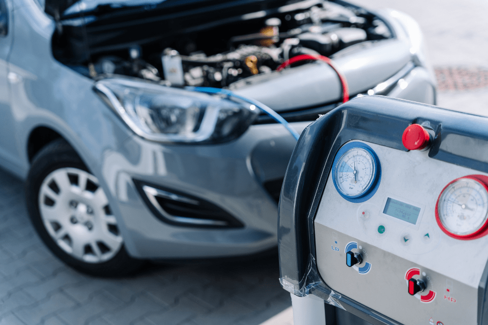 Car a/c inspection in Centerville, OH by C’s Autohaus. Image of a car connected to an automotive air conditioning service machine, highlighting the shop’s commitment to comfort, efficiency, and reliable climate control performance.