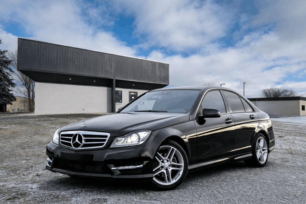 Mercedes C-Class W204, auto repair in Centerville, OH by C’s Autohaus. Image of a black Mercedes-Benz sedan parked outside the shop, showcasing professional European vehicle service and maintenance expertise.