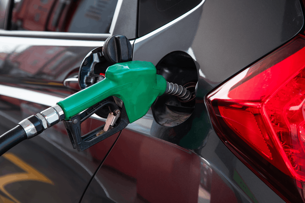 Gas mileage, auto repair in Centerville, OH, at C's Autohaus. Image of a vehicle being refueled at the fuel filler, highlighting the importance of clean fuel delivery and routine fuel system maintenance for reliable performance and efficiency.